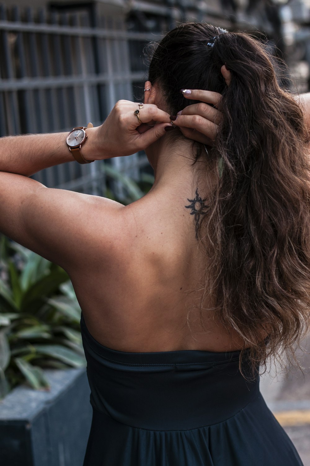 a woman with a star tattoo on her back