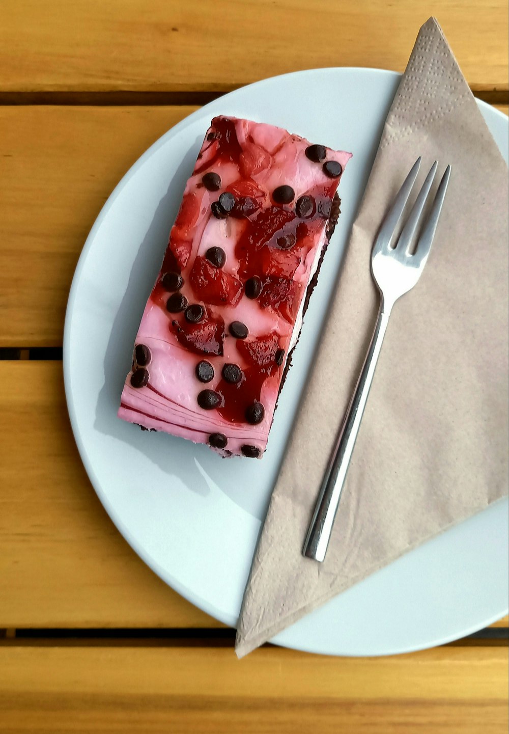 a piece of cake on a plate with a fork