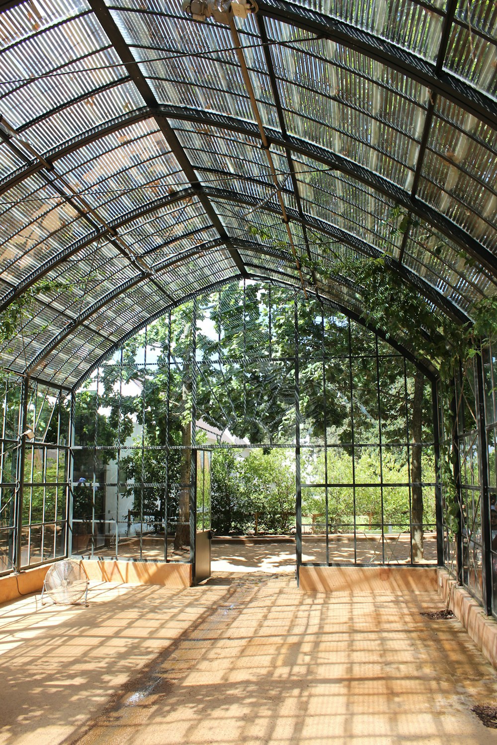 the inside of a building with a glass roof