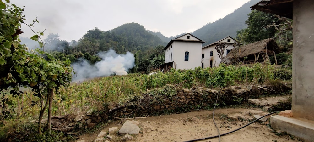 smoke coming out of the chimney of a house