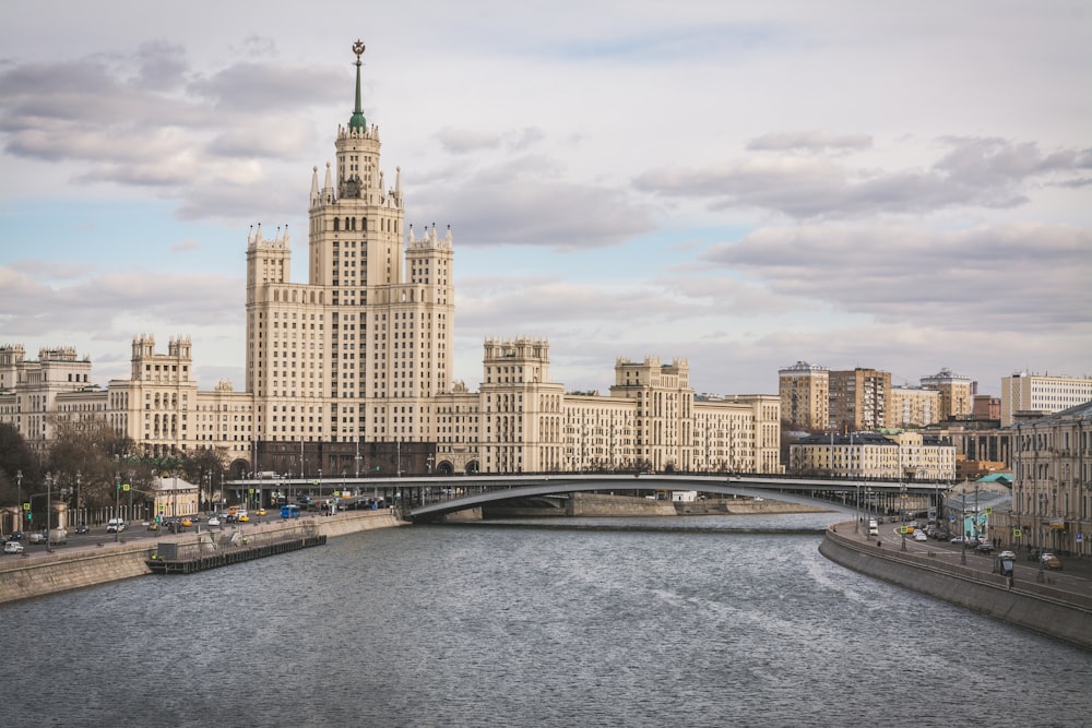 a river running through a city with tall buildings