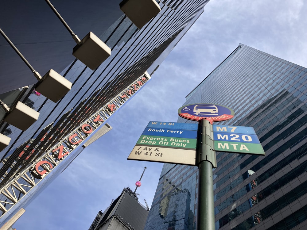 a street sign in front of a tall building