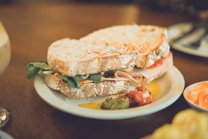 a close up of a sandwich on a plate on a table