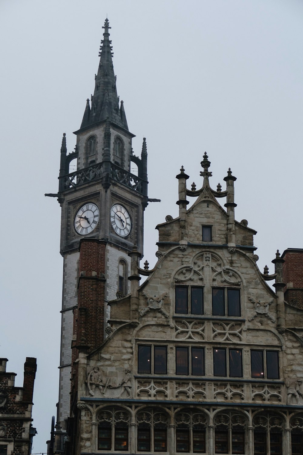 a large building with a clock on the front of it