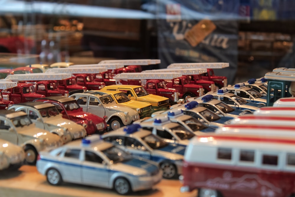 a bunch of toy cars that are on a table