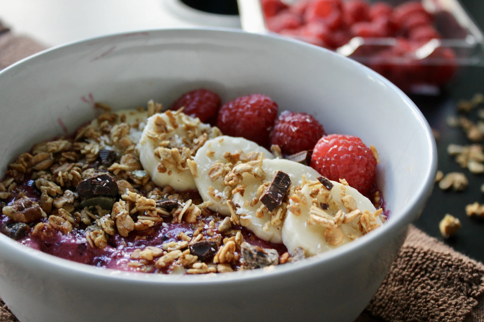 Real breakfast bowl with fruit, grains, and granola