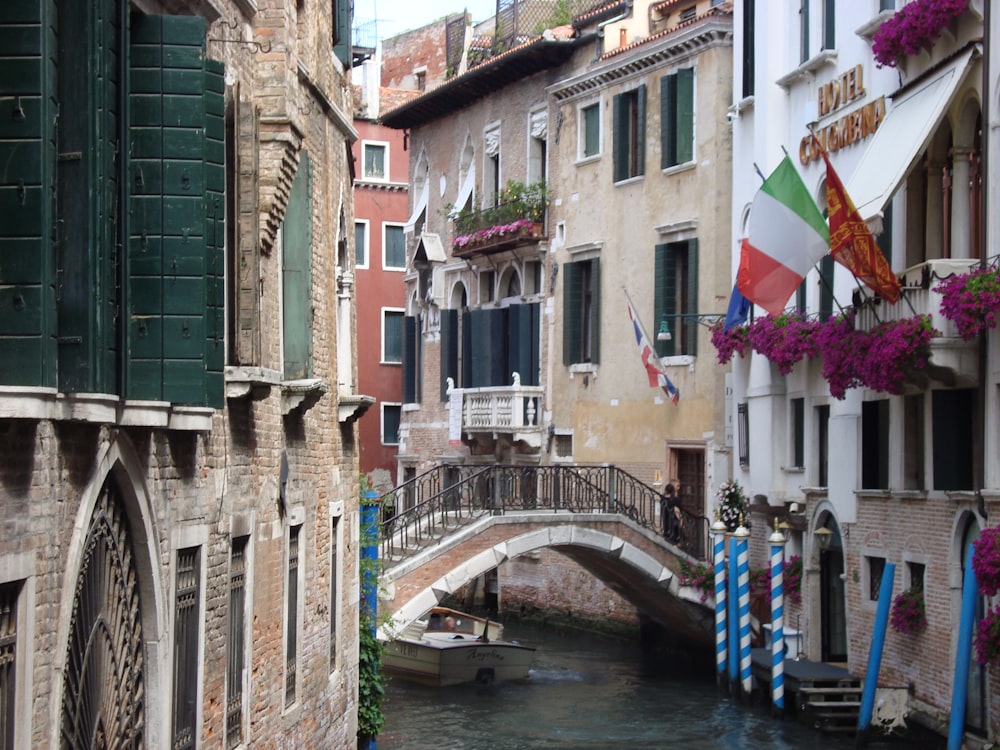 a bridge over a canal in a city