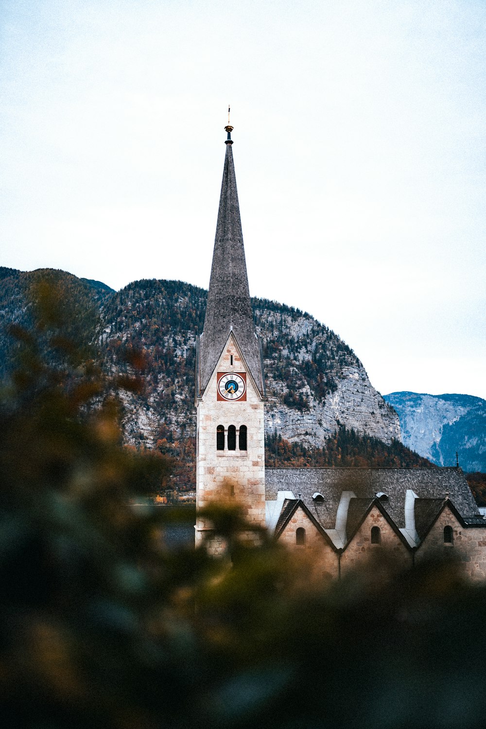 a church steeple with a clock on it