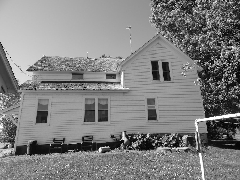 a black and white photo of a house