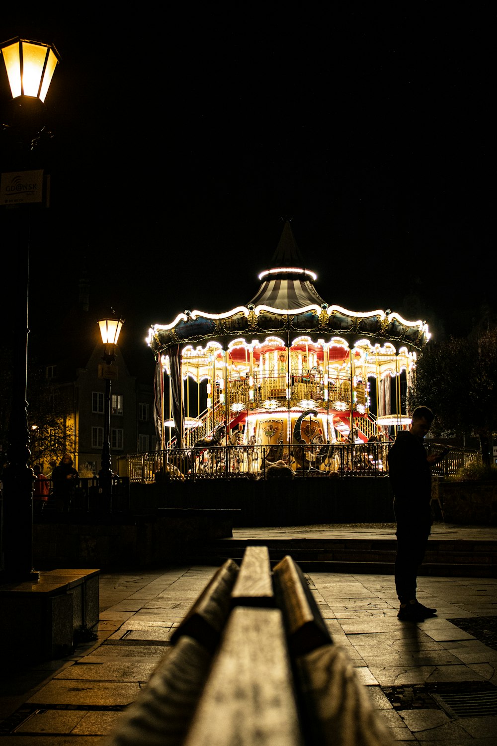 a merry go round lit up at night