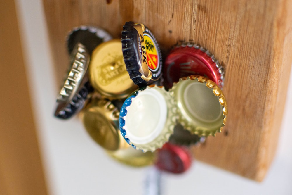 a close up of a bottle opener on a wall