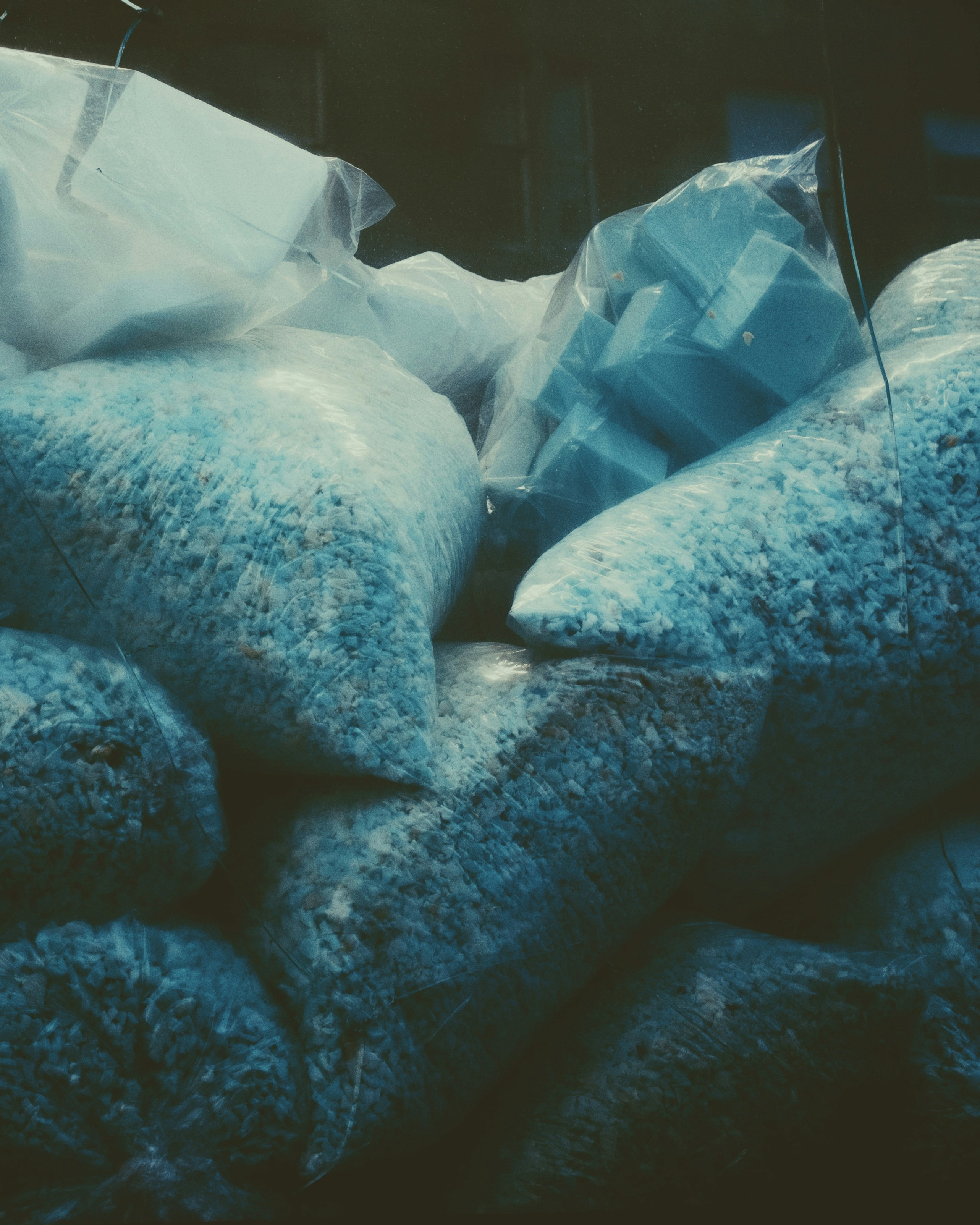 a pile of bags sitting next to each other