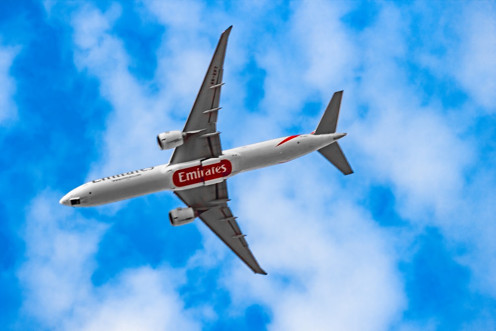 a large commercial airplane flying in the sky