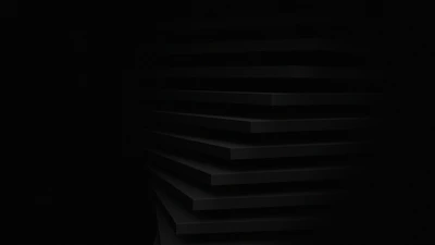 a black and white photo of a dark room