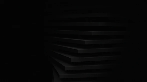 a black and white photo of a dark room