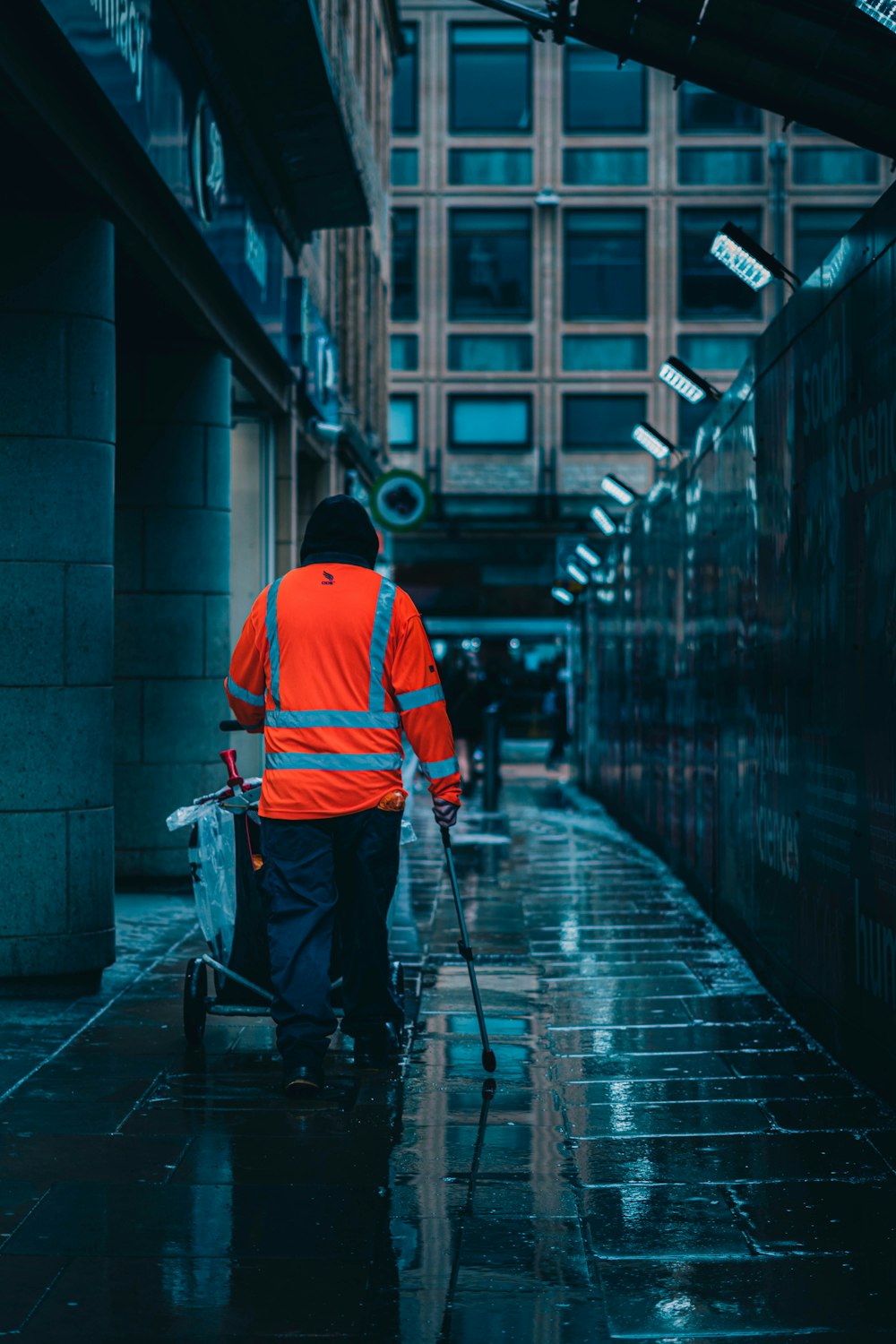 a person that is standing in the rain