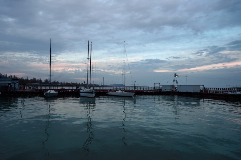 a couple of boats that are sitting in the water