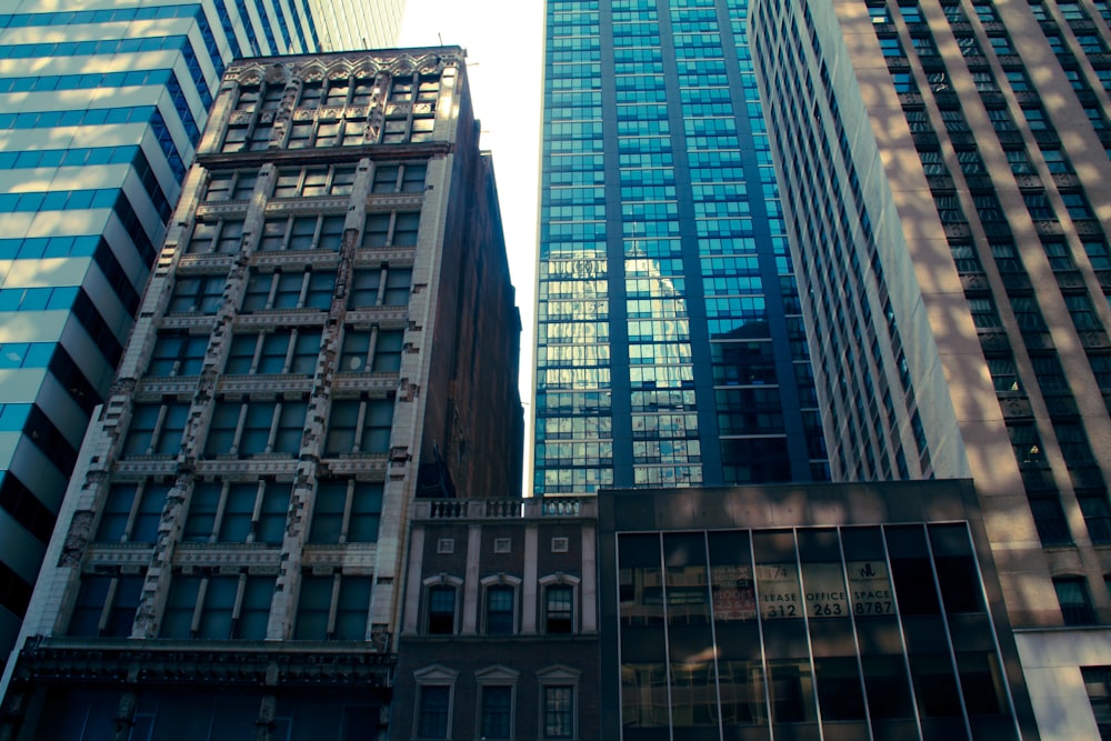 a group of tall buildings in a city