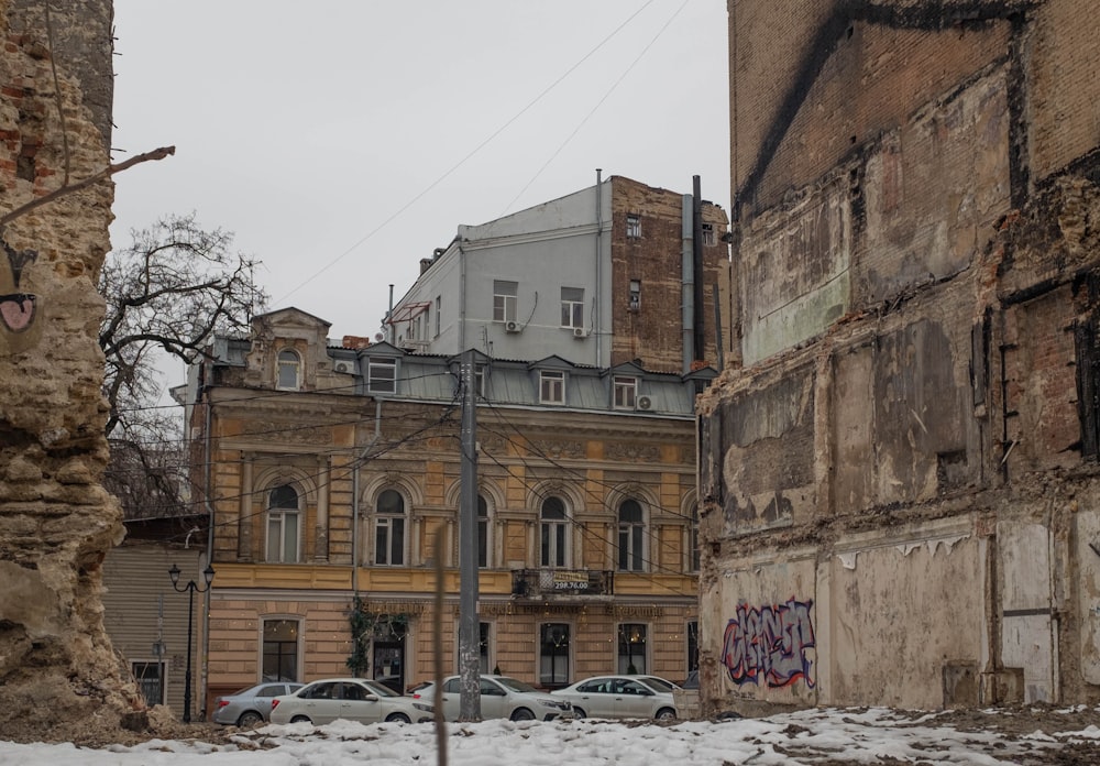 an old building with graffiti on the side of it