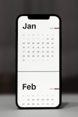 a calendar phone case sitting on top of a table