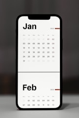 a calendar phone case sitting on top of a table