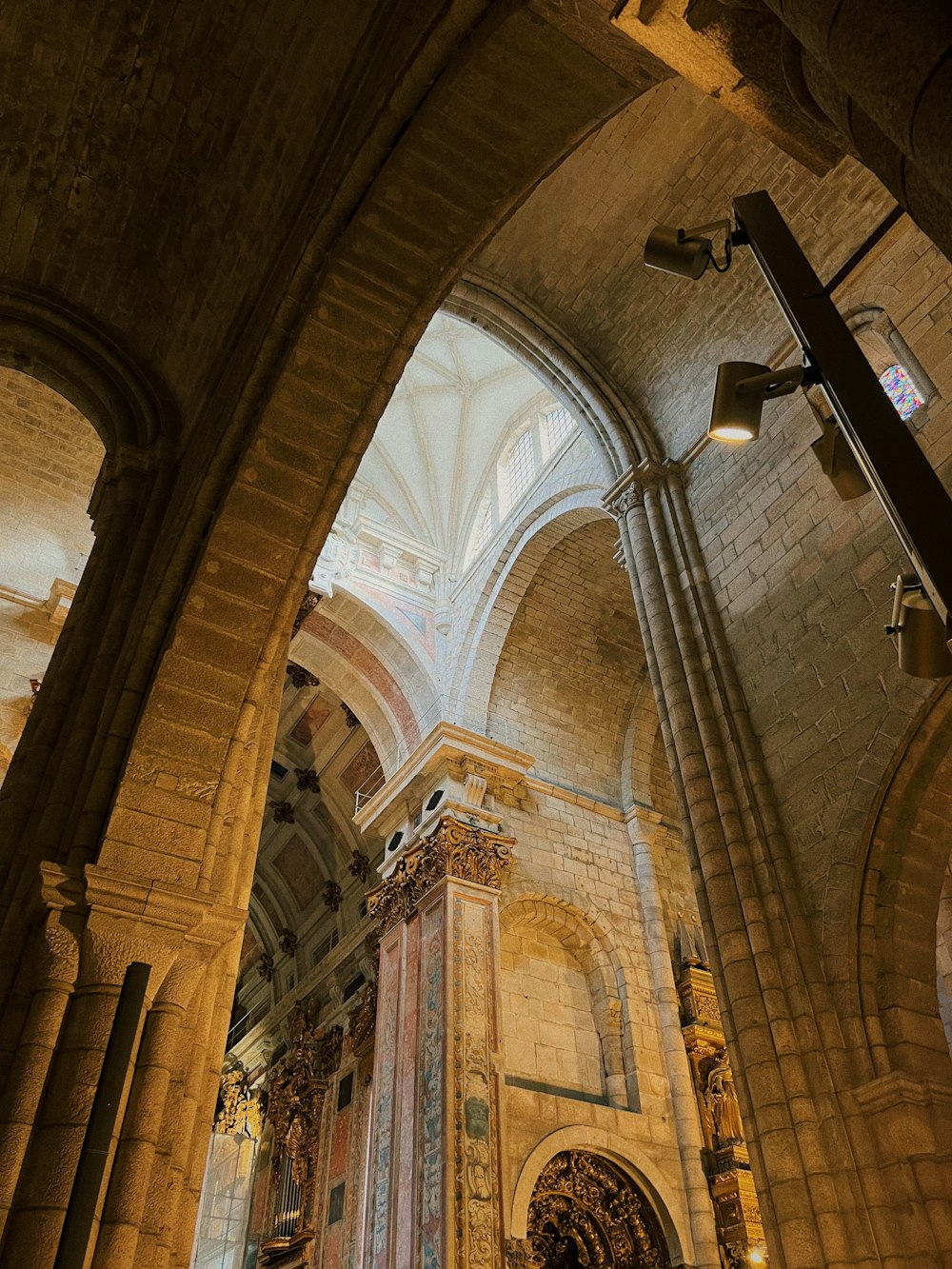 a large cathedral with a clock on the wall