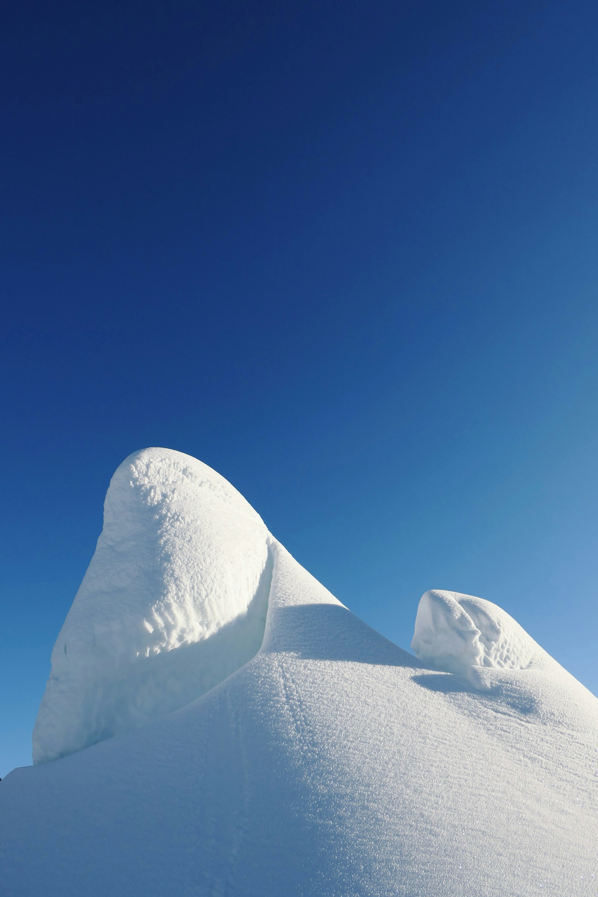 a person on a snowboard in the snow