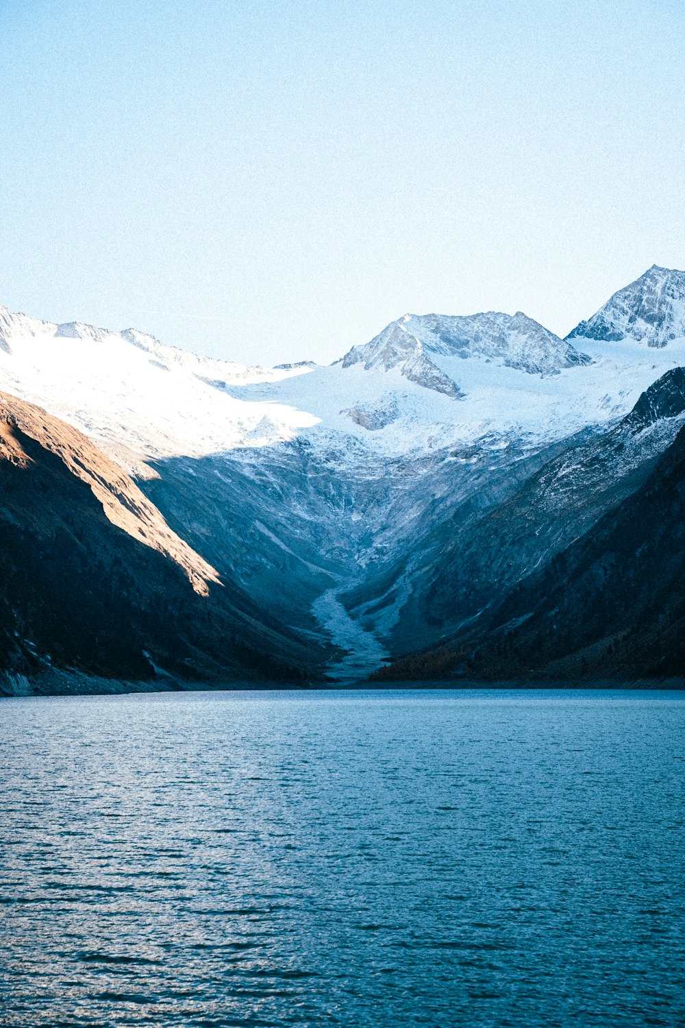 a large body of water surrounded by mountains