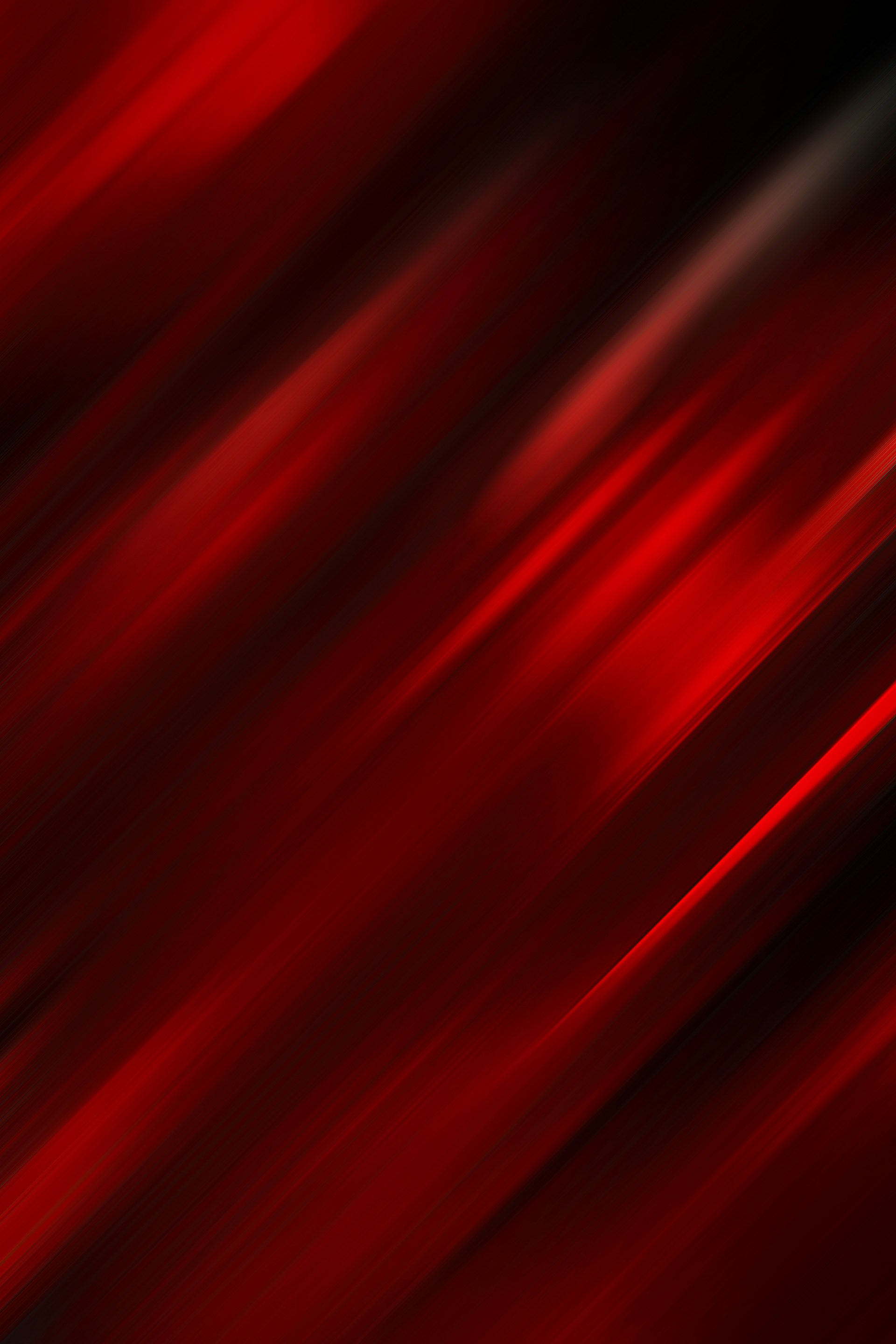 a red and black background with some blurry lines