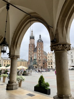 a large building with a clock tower in the background