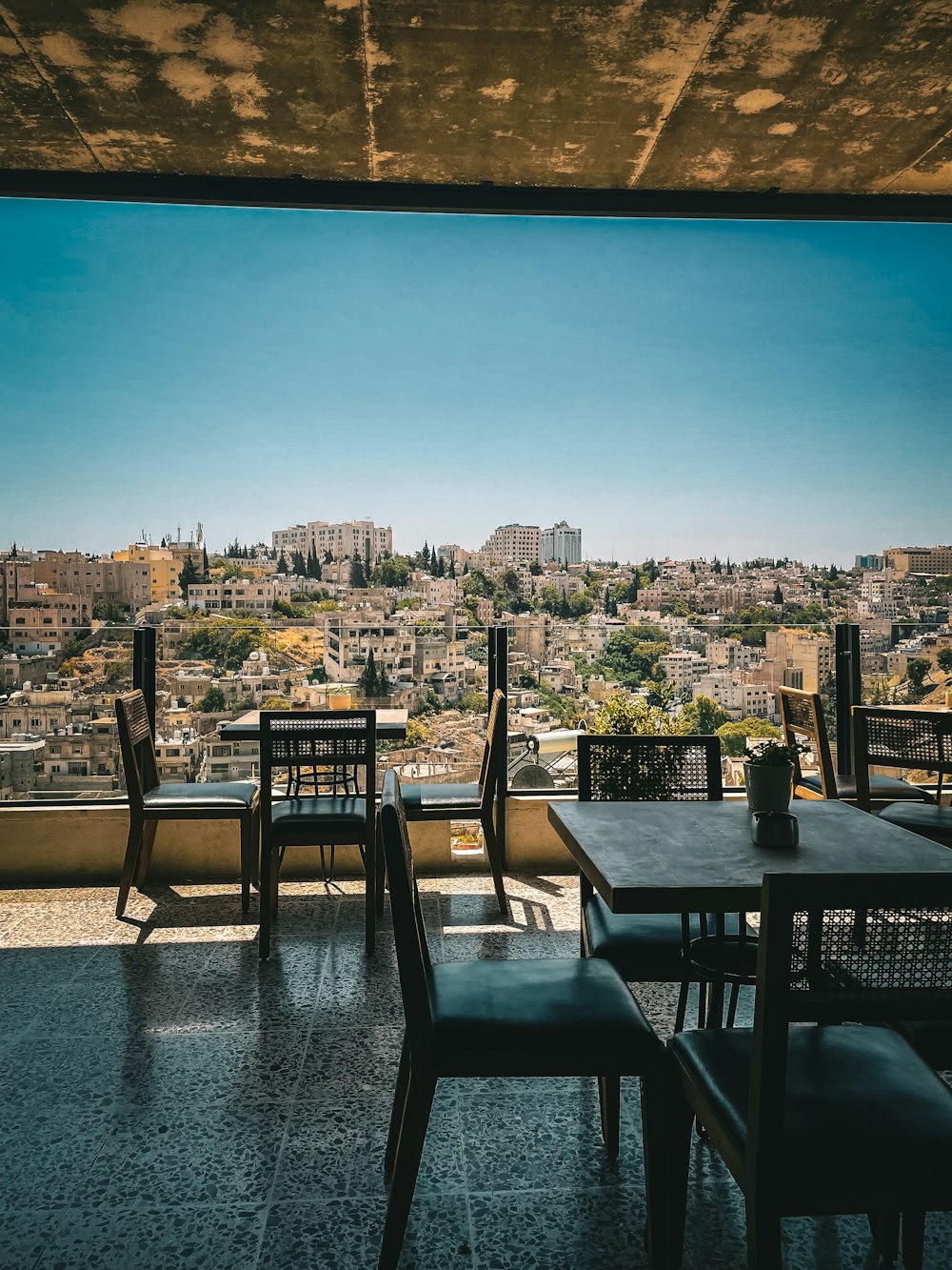 a view of a city from a restaurant