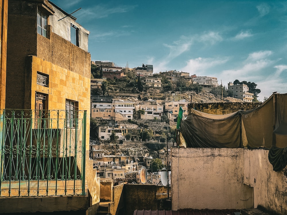 a view of a city with a hill in the background