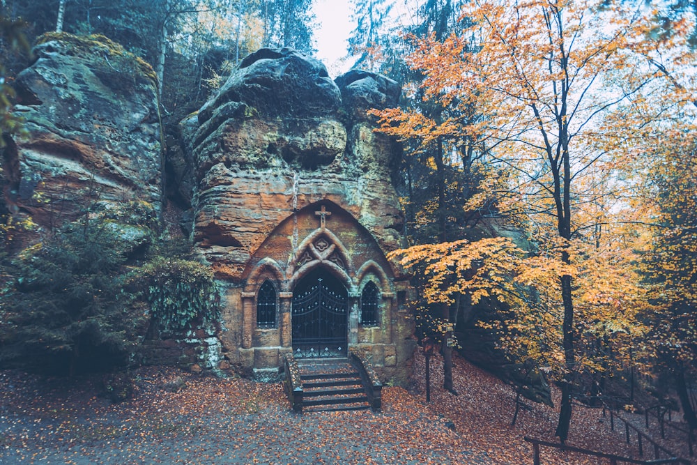 an old church built into the side of a mountain