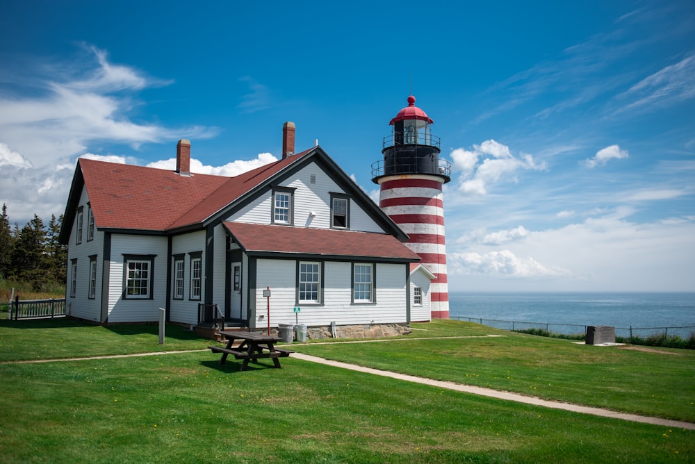 a white house with a red and white stripe on it