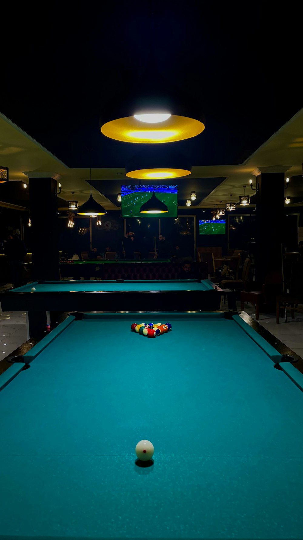 a pool table with a pool ball on it