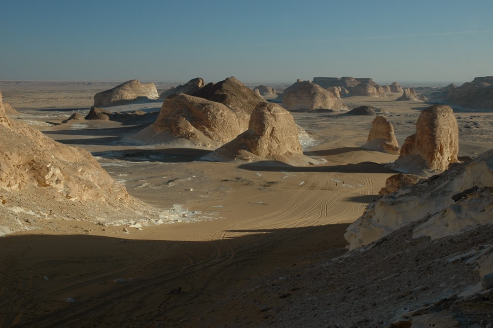 a desert landscape with rocks and sand