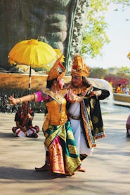 a couple of people that are standing in the street