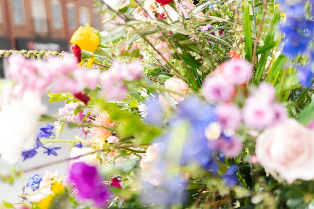 a bunch of flowers that are in a vase