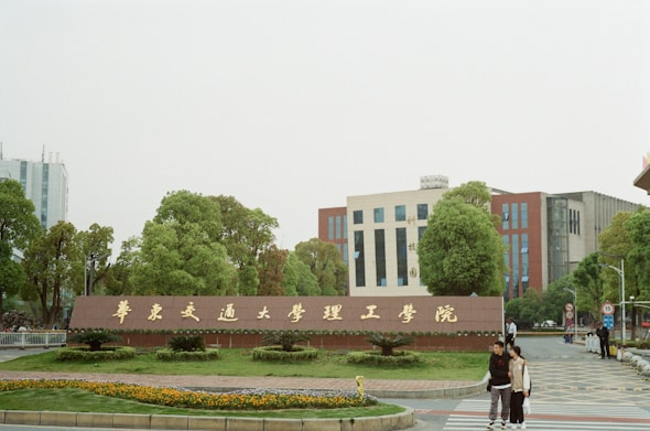 a couple of people that are standing in the street