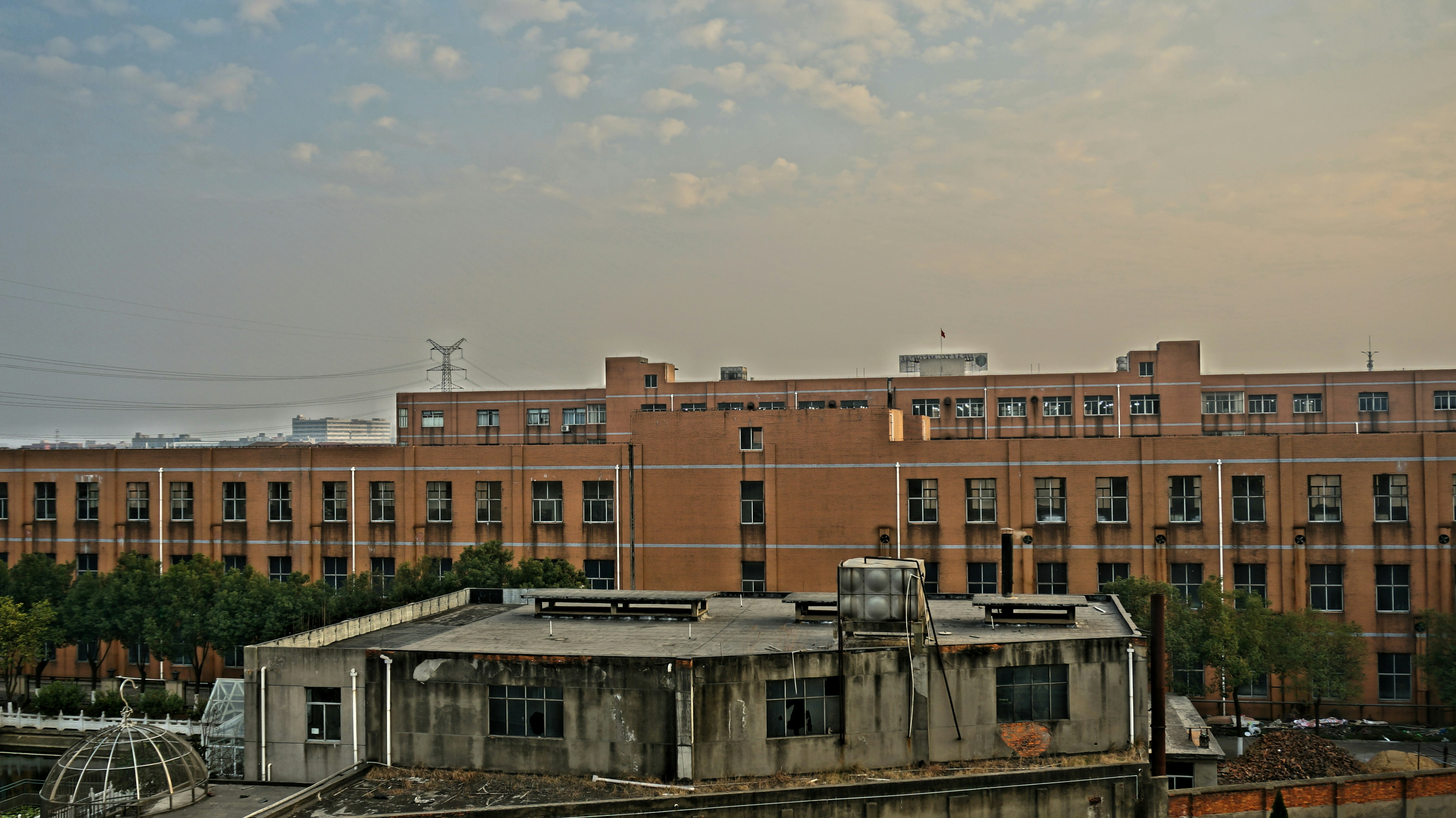 a building with a lot of windows and a sky background