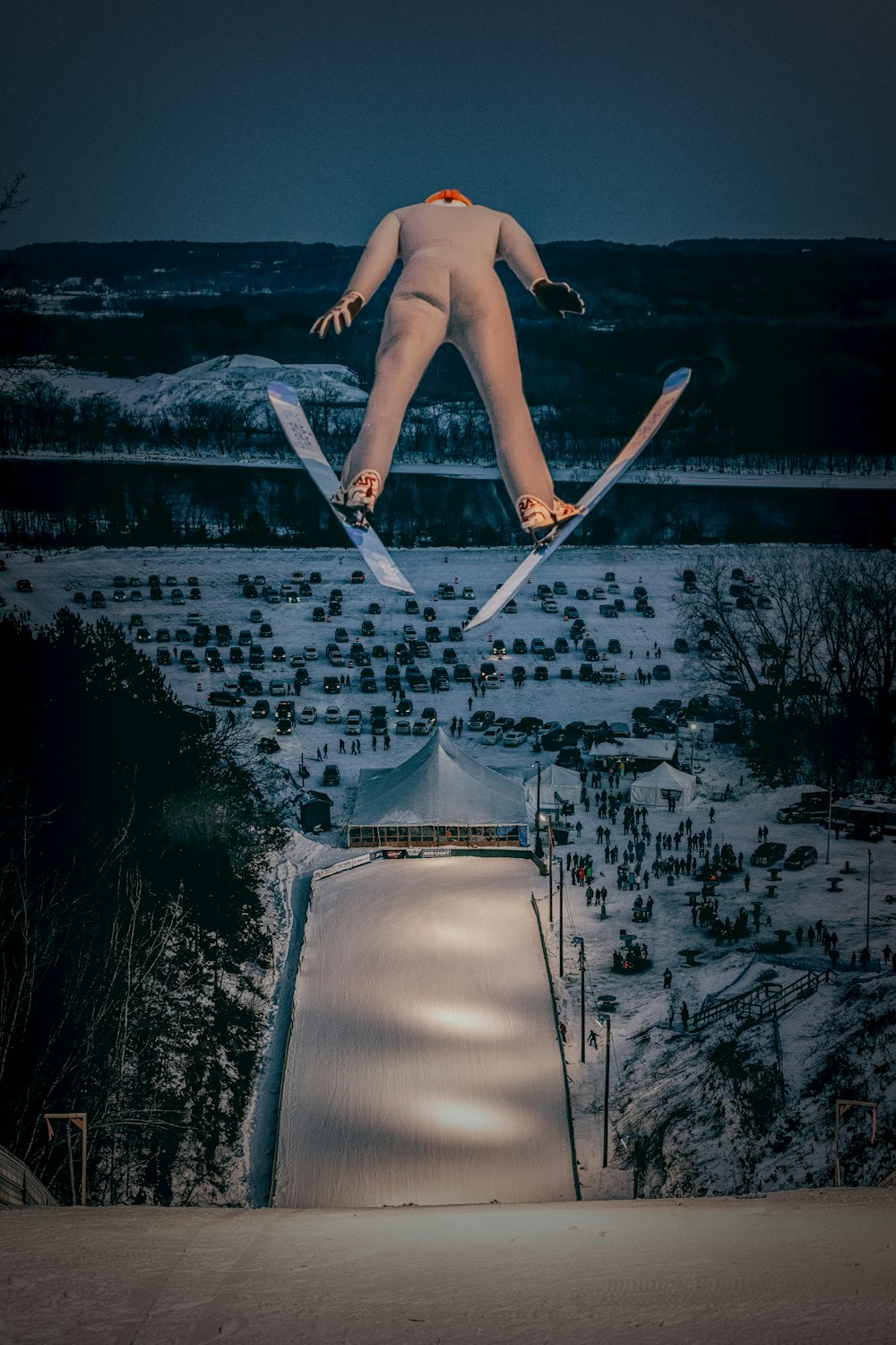 a man flying through the air while riding skis