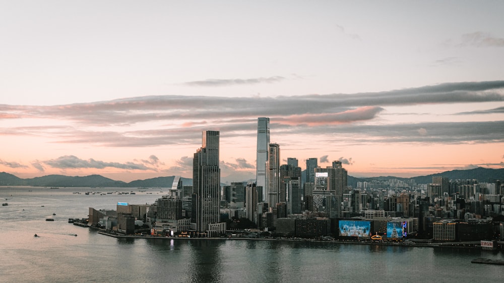 a view of a large city with a body of water in front of it