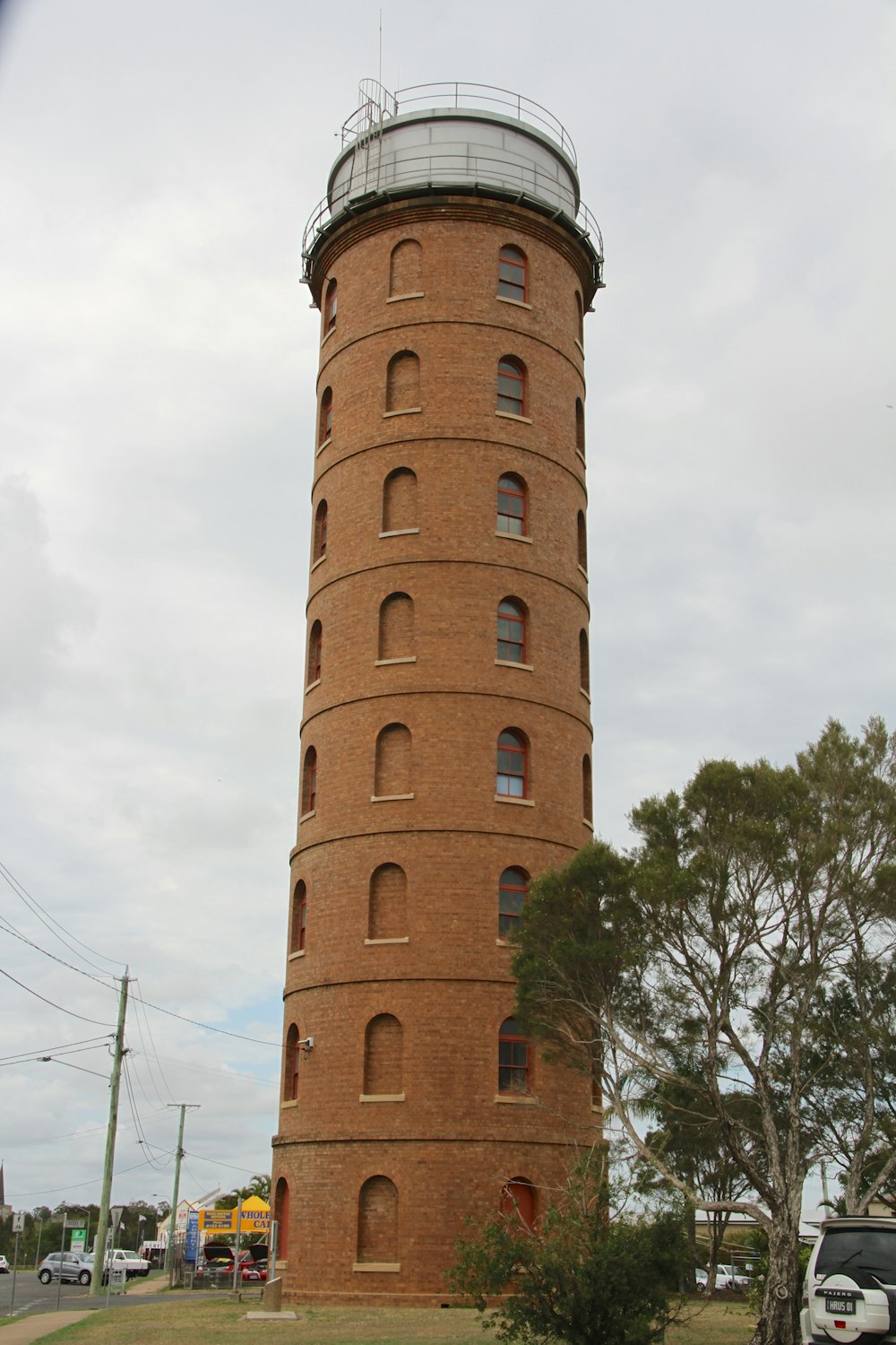 a tall brick tower with a sky background