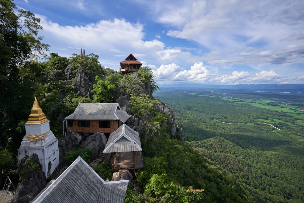 a view of a mountain top with a tower in the middle