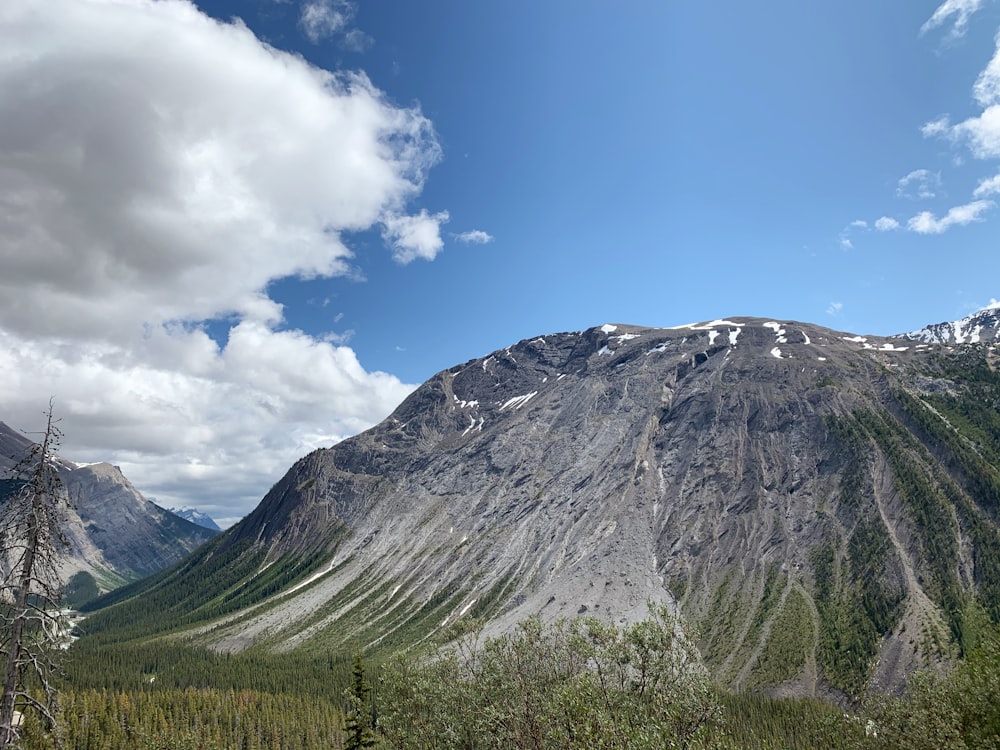 a view of a mountain with snow on it