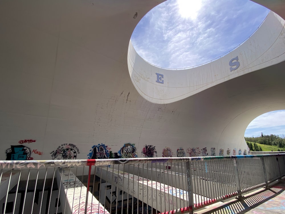 a large white building with a skylight above it