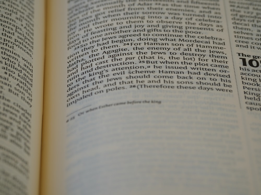 a close up of an open book with text