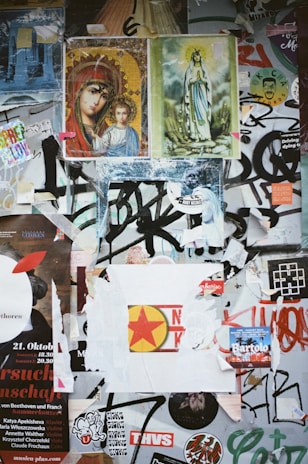 A collage of saint story thumbnails from Spanish, English, and Italian YouTube channels.