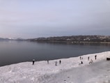 Participants enjoying a mindful outdoor activity surrounded by melting snow.
