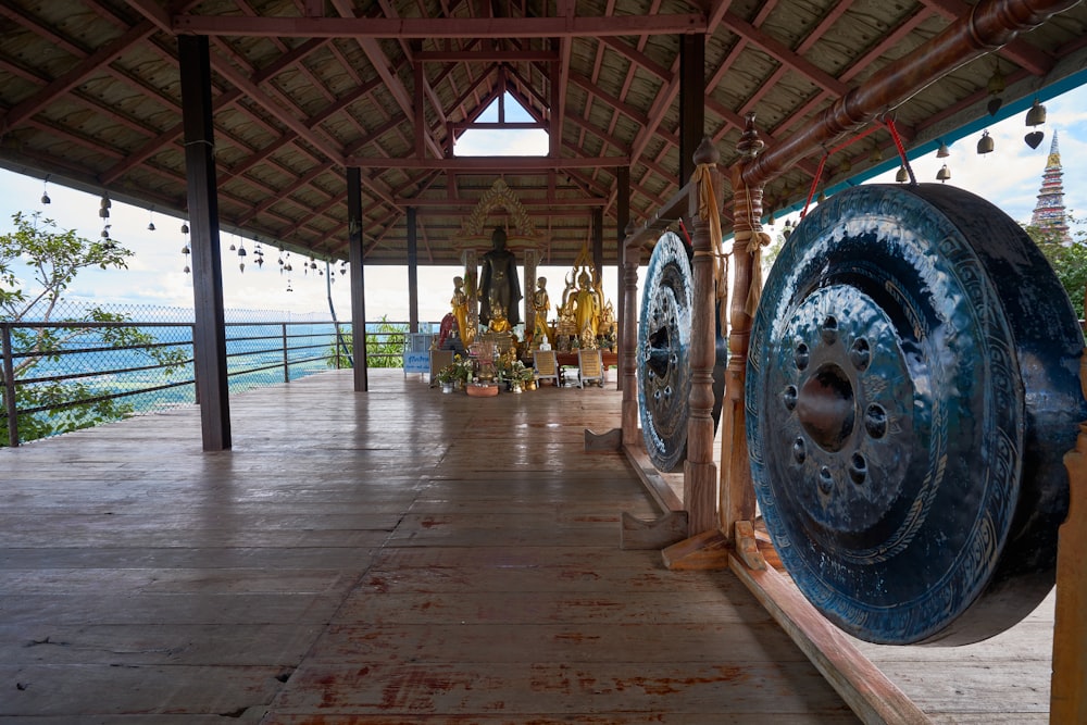 a room filled with lots of large metal wheels